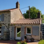 Maison existante en pierres apparentes