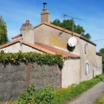 Maison existante en pierres apparentes